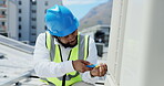 Black man, engineer and inspection with screwdriver for panel fitting and turning on rooftop in the city. African American male contractor or technician fixing electrical box for maintenance check