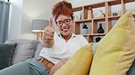 Face, black woman and thumbs up for success, smile and thank you on lounge sofa for support. Portrait, happy female and thumb hands in house for like emoji, trust and yes opinion of agreement review 