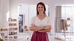 Happy, office and face of a woman with arms crossed for fashion, small business and entrepreneurship pride. Smile, clothes and portrait of a designer smiling at a manufacturing boutique workplace