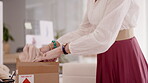 Small business, online shopping and package of a woman entrepreneur with startup company. Designer, clothing retail and shipping box with a female worker doing an inventory and distribution order