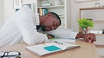 Corporate black man, tired and sleeping at office desk with burnout, depressed or overworked. African businessman, exhausted and mental health for relax, fatigue and sleep for rest at workplace table