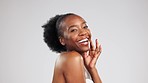 Black woman, face and beauty, laughing and skincare, happiness with glow on studio background. Healthy skin, portrait and dermatology with mockup space, happy female with natural cosmetics shine