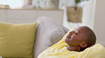 Black woman, home and hands behind head on sofa to relax and rest in peace, quiet and comfort. Happy model person on lounge couch with freedom, calm and happiness for daydream and mental health time