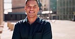 Pride, happy and portrait of a businessman with arms crossed in the city of Singapore. Smile, working and face of a corporate employee downtown with success in professional career and happiness