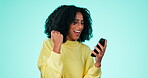 Winning, yes and phone of black woman isolated on a green background fist pump, celebration or competition winner. Excited, wow person on smartphone, cellphone or mobile app bonus, sale or good news