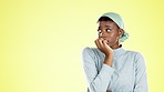 Black woman, fear and anxiety with stress and scared, mental health and emotional abuse on yellow background. Nervous, anxious and frightened female with mockup space, biting nails with phobia