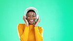 Music, dance and black woman with headphones with color for streaming audio, radio and track. Happy, party mockup and girl dancing for relaxing, celebration and positive attitude on studio background