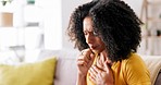 Black woman, cough and hand in house on sofa with flu, tired and medical problem in lounge. Girl, health and chest pain for allergy, sinus or sick on couch, home living room and frustrated coughing