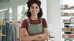 Woman, fashion designer and logistics in small business confidence, leadership or management at workshop. Portrait of happy and confident clothing owner with arms crossed for retail entrepreneurship