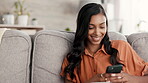 Woman, phone and smile for chatting on living room sofa in communication, texting or social media at home. Happy female relaxing and smiling on smartphone for networking, browsing or chat on couch