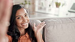 Woman, phone and selfie on living room sofa for vlog, profile picture or social media post at home. Portrait of happy female with facial expressions on smartphone for photo or networking on couch