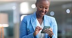 Black woman, night business and laughing on cellphone in office, online app and contact technology. Happy female worker, overtime and smartphone for reading funny notification, social media or mobile