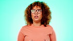 Anger, frustration and annoyed with a black woman in studio on a blue background feeling angry. Stress, frustrated or conflict and a female looking unhappy or negative with negative body language