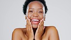 Black woman, face and laughing in beauty portrait, facial and skincare with happiness on studio background. Hands touching skin, natural shine and dermatology, mockup space and cosmetic care wellness