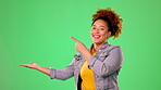 Mockup, pointing and smile with black woman in studio for promotion, announcement and news. Happy, offer and choice with girl and hand gesture for product placement, information and presenting