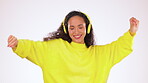 Headphones, dancing and woman in studio excited and isolated on white background with smile and happiness. Music, technology and dance, dj on fun online radio station or streaming party celebration.