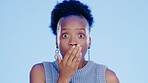 Black woman, studio and shock face by background for news, portrait or gossip with hand on mouth. Gen z model, young african and wow with omg surprise, notification or trendy fashion by blue backdrop