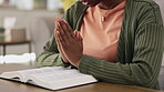 Black woman, hands and praying, worship with Bible and Christian, faith and spiritual, gratitude and hope in religion. Religious scripture, trust and female in prayer with respect, holy book and God