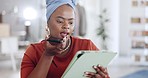 Phone call, tablet and business woman in the office while doing research for a corporate project. Cellphone, professional and African female employee on a mobile conversation in the modern workplace.