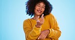 Happy black woman, dancing and beauty in studio by blue background for fashion, smile and face. Young gen z student, comic dance or freedom with yellow clothes, curly hair afro or fitness in portrait