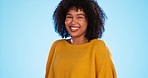 Face, funny and black woman with smile, excited and cheerful against a blue studio background. Portrait, African American female and lady with freedom, laughing and carefree with happiness and joyful