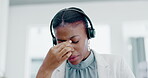 Black woman, call center and headache in stress, burnout or anxiety from strain at the office. African American female consultant suffering head pain, ache or sore eyes feeling overworked or stressed