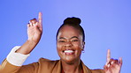 Face, dance and excited with a black woman in studio on a blue background for fun or freedom. Portrait, smile and energy with a happy african american female dancing to music in joy or celebration