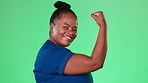 Happy, flex and strong with black woman in studio for muscle, empowerment and power. Champion, achievement and fitness with arm of lady isolated on green background for confident, pride and self love