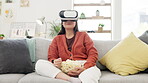 VR, watching movies and woman on sofa with popcorn for funny comedy show in metaverse, cyberpunk and high tech experience. Young person relax on couch eating and laughing in virtual reality glasses