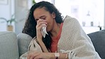 Crying, depressed tears and sad woman on living room sofa with a tissue and mental health problem. House, anxiety and suffering of a mixed race female on a home lounge couch with tissues in distress