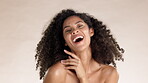 Beauty, skincare and laugh with black woman in studio for cosmetics, satisfaction and self love. Cosmetics, confident and glow with face of model for clean, dermatology and spa on brown background 