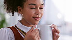 Face, coffee and thinking with a black woman smelling the aroma of a fresh beverage while taking a break to relax. Happy, drink and daydreaming with an attractive female enjoying the smell from a mug