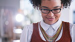 Glasses, fashion and happy with a designer black woman at work in her studio for creative style. Face, workshop and smile with an attractive young female working on a project in a design company