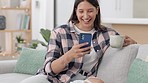 Funny, woman on couch and smartphone for typing, smile and connection in living room. Happy female, lady and cellphone for social media, coffee and cheerful in lounge, carefree or laughing with humor