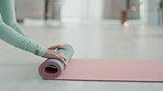 Fitness, rolling and yoga mat with feet of woman on living room floor for workout, training and exercise. Spiritual, balance and wellness with girl at home for pilates, health and meditation