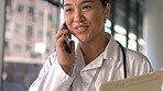 Woman, doctor and phone call in hospital for folder of clinic test results, healthcare advice and help. Happy female medical worker talking on smartphone for telehealth consulting, contact and report