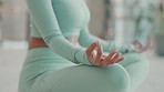 Yoga hands, woman and home zen exercise of a young mixed race female doing meditation. Mindfulness, chakra and peace workout with pilates in a house with a person doing a spiritual sport to relax