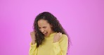 Excited, winner and happy woman in studio for celebration, achievement deal and lotto success on pink background. Winning, yes and fist of female model celebrate lottery, bonus promotion or happiness