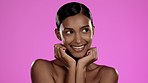 Beauty, skincare and happy Indian woman in studio posing with hands, cosmetics and isolated on pink background. Natural makeup, dermatology and skin care model with luxury spa or salon detox facial.