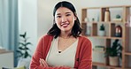 Asian woman, face and startup with arms crossed in office for management, happiness and leadership. Small business owner, young entrepreneur and happy smile in workplace portrait at job in Tokyo