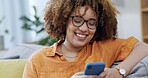 Happy woman laughing on a phone and sofa for funny internet meme, social media post or texting on mobile app. Young black person on couch or living room typing on a cellphone, smartphone or web chat