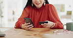 Woman hands, credit card and phone for business online shopping, trading or fintech payment in office startup. Professional person typing bank information on cellphone for website loan or transaction