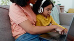 Child, mother and headphones with laptop for learning and online education with internet connection. Black family or woman and girl kid talking elearning video knowledge with home wifi on lounge sofa