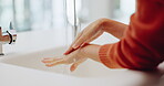 Water, washing hands and cleaning at sink in bathroom for hygiene, wellness or health. Skincare, liquid and woman clean hand to remove bacteria, germs and dirt, sanitary and disinfection in home.