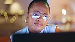 Business, night and face of black woman on computer working on online project, report and research in office. Vision, thinking and female worker with focus, concentration and reading screen at night