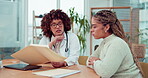 Woman doctor consulting patient with serious news, test results and risk advice reading or analysis of document folder. Biracial medical professional or people in healthcare service and consultation