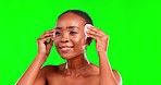 Skincare, cotton and black woman cleaning face in studio for wellness, beauty and routine on green screen background. facial, pad and girl skin model relax with pamper, cosmetics and treatment