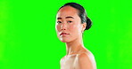 Beauty skincare, face and Asian woman on green screen in studio isolated on a background mockup. Makeup, natural cosmetics and female model with healthy or flawless skin after spa facial treatment.