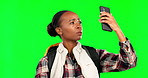 Lost, gps and phone with black woman on green screen studio for travel app, explorer and navigation. Confused, map and trip with tourist search for connection, location and backpacking on background