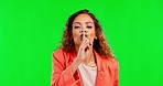 Secret, hush and face of a woman in a studio with a finger on her mouth for gossip or silence. Whisper, noise and portrait of a female model with a quiet hand gesture by a green screen background.